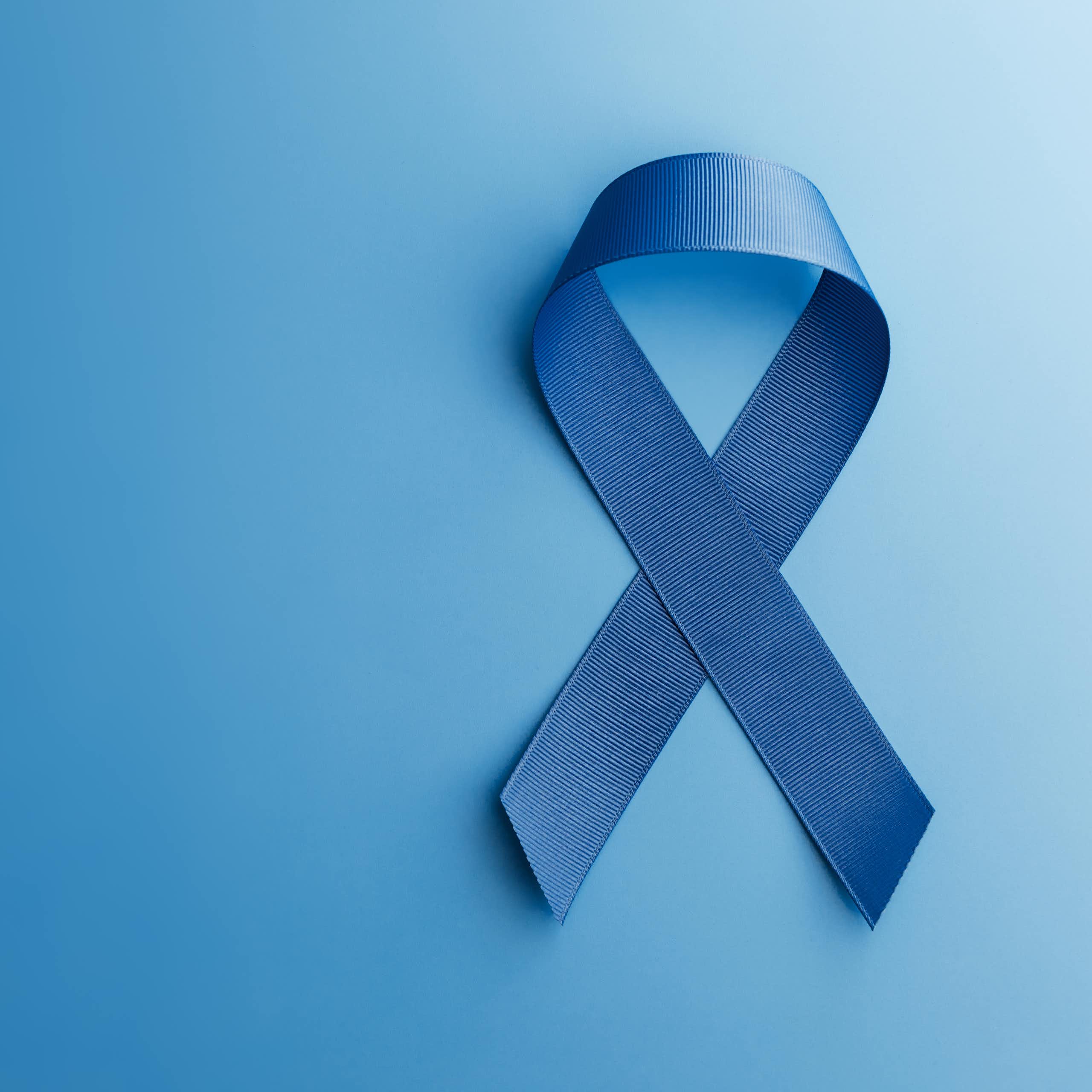 Blue ribbon with the ends crossed over