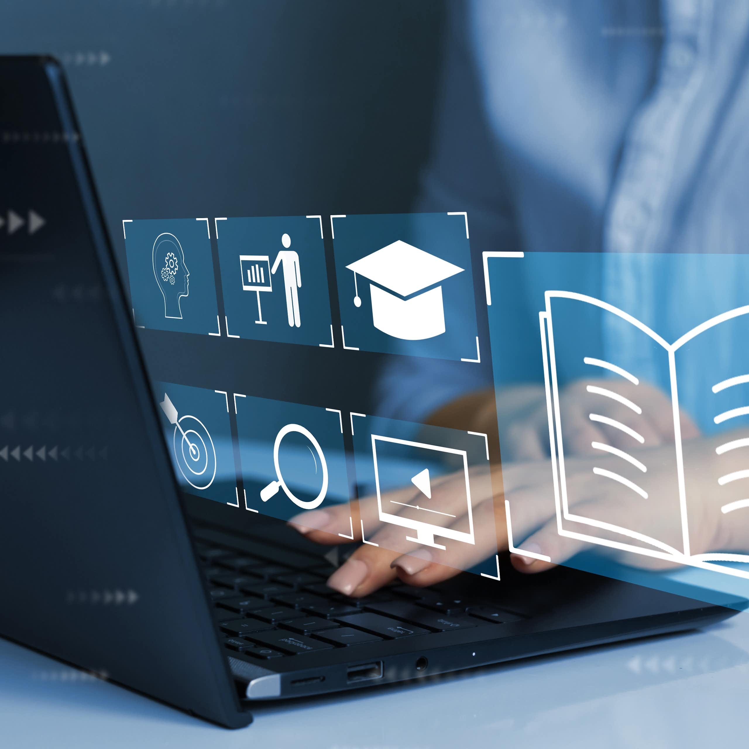 Hands seen at a laptop with digital icons floating.