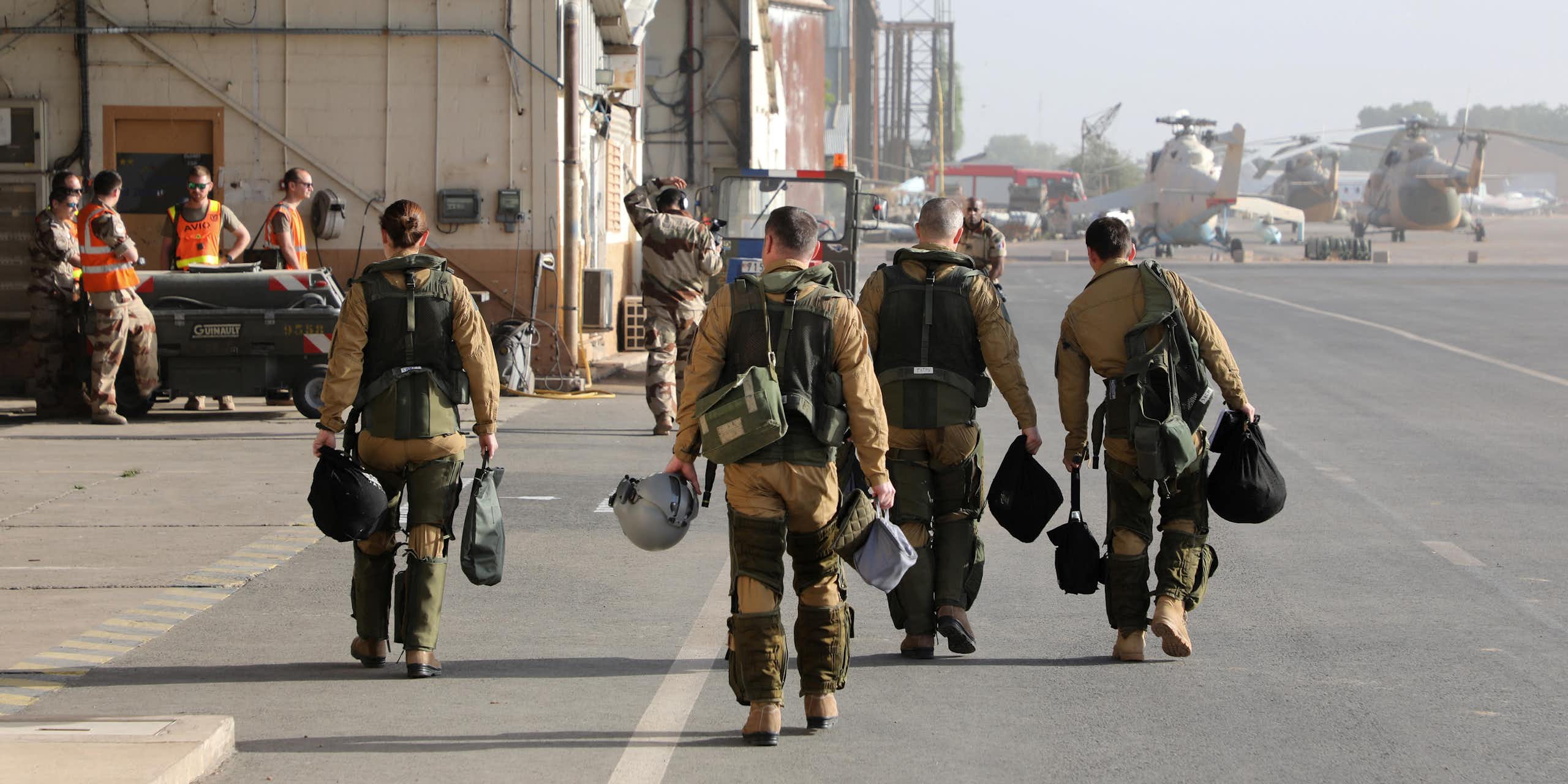 Men in military uniform at a military base